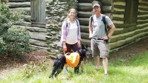 My wife Sarah and I on a hike up in PA. Loki carried his own food and water and had a blast!